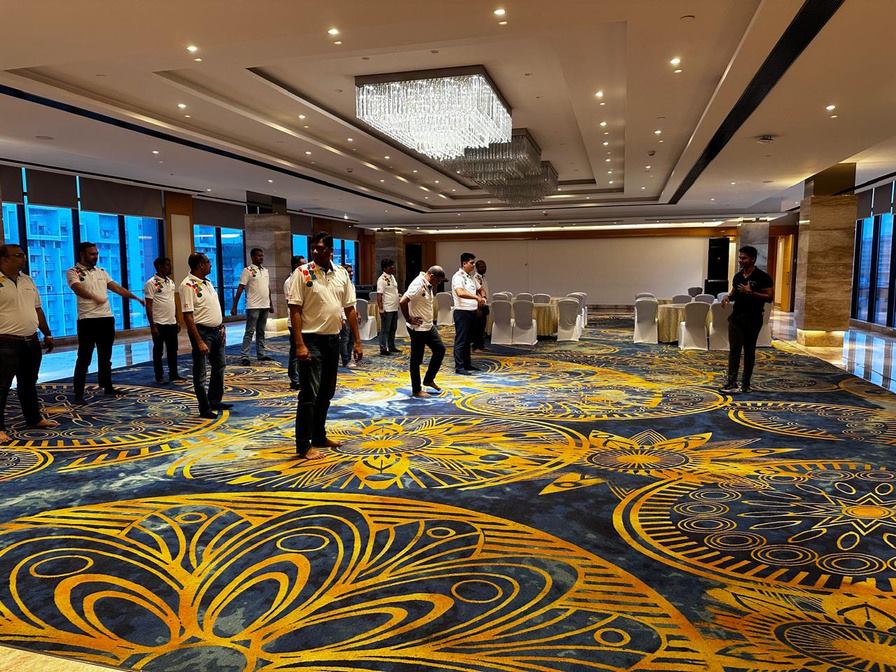 A team wellness session set up in a hotel ballroom