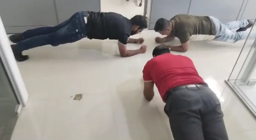 Colleagues taking on a plank challenge together
